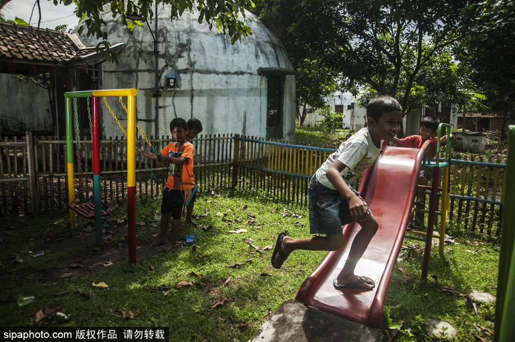 印尼海嘯十年后的災民村 圓頂房屋造型奇特成旅游景點